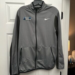 Nike men’s long sleeve full zip March Madness jacket. Size Medium.